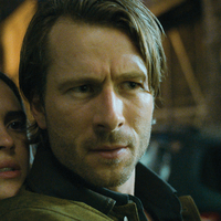 Adria Arjona and Glen Powell in <em>Hit Man.</em>