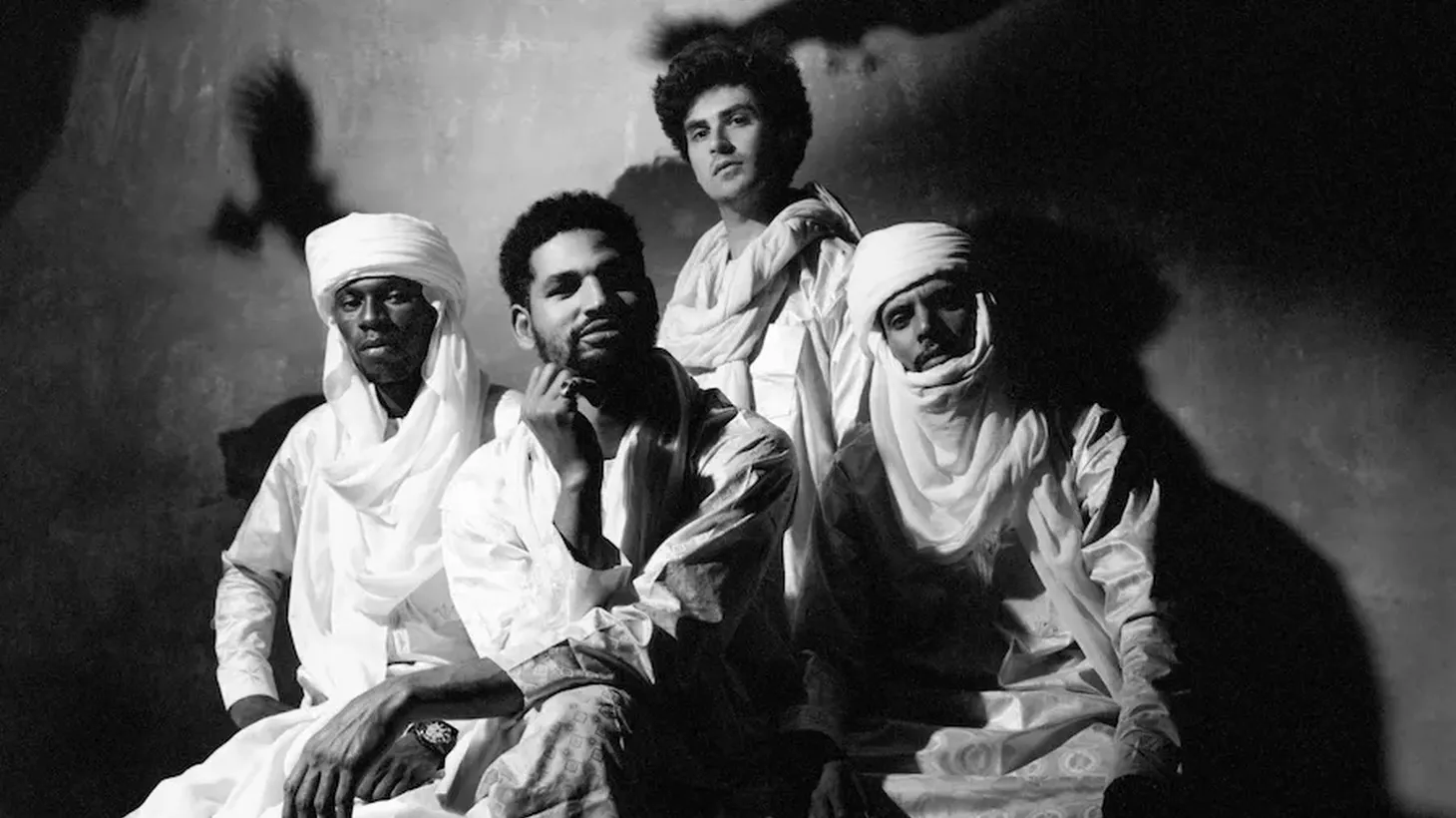 Mdou Moctar (center) appears with his band. Their latest album, “Funeral for Justice,” focuses on French colonialism in Niger.