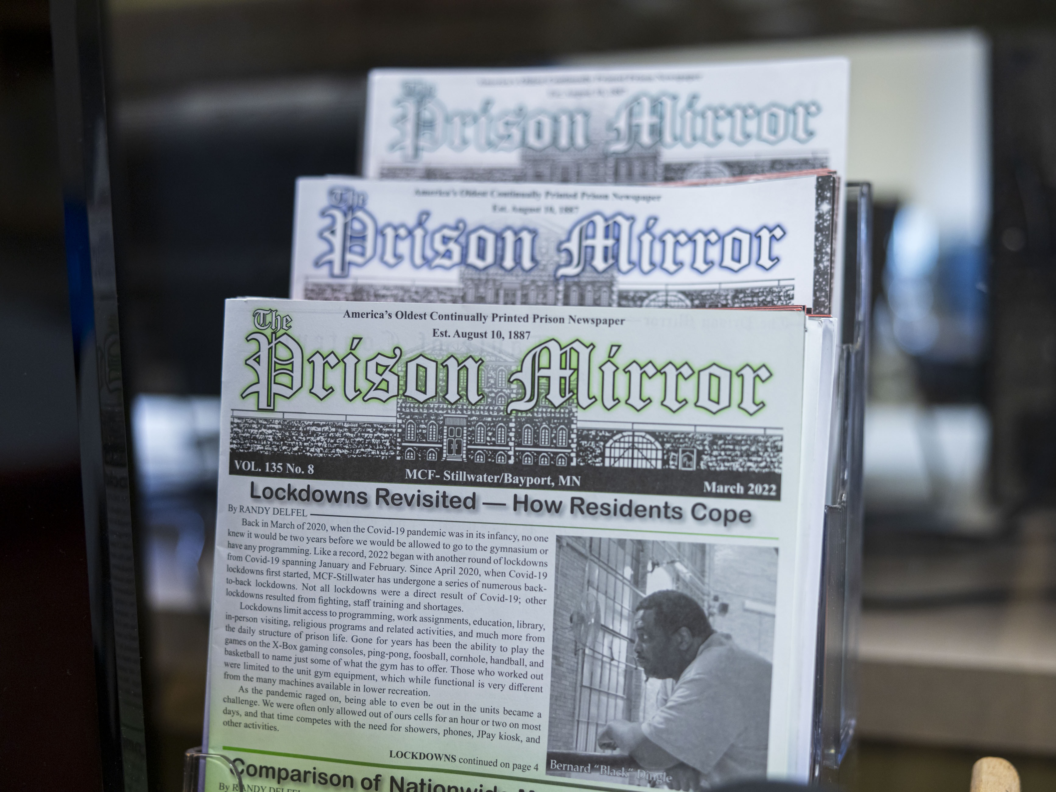 Previous issues of the <em>Prison Mirror, </em>which has been publishing since 1887, sit on display in the Minnesota Correctional Facility - Stillwater.