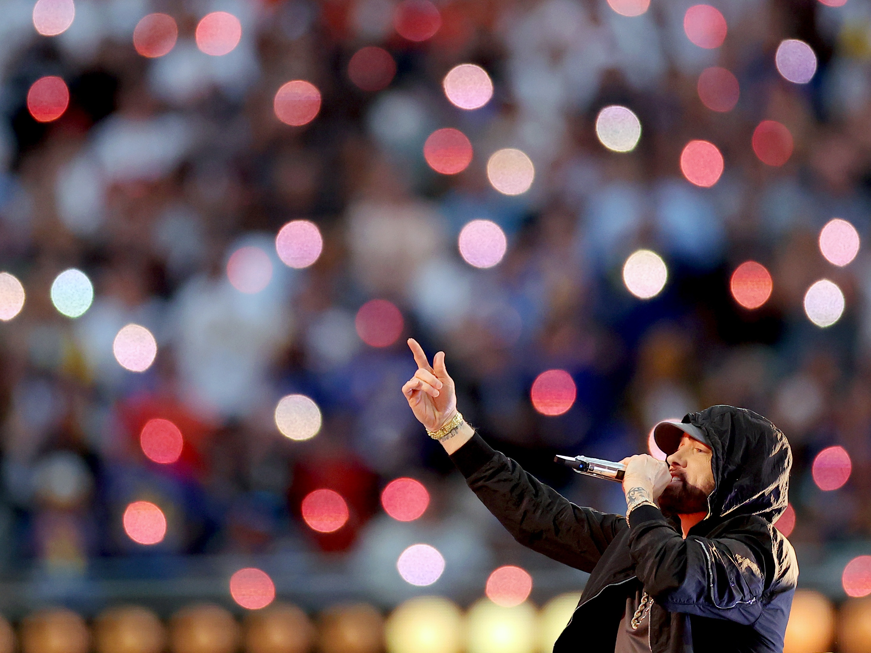 Eminem, performing here during the Super Bowl LVI Halftime Show at SoFi Stadium in 2022, returns to the top 10 of the <em>Billboard</em> Hot 100 chart this week with "Houdini."